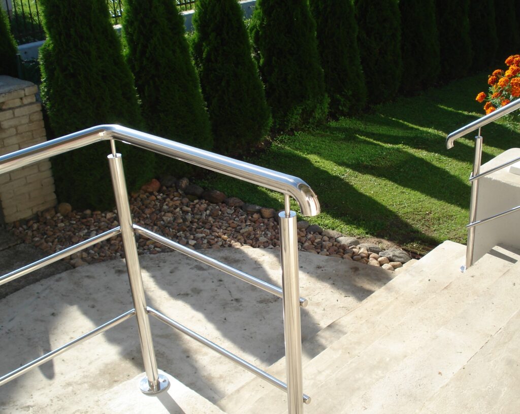 stainless steel stair handrailing with round pipe mounting posts and horizontal inserts stainless steel stair handrailing with round pipe mounting posts and horizontal inserts